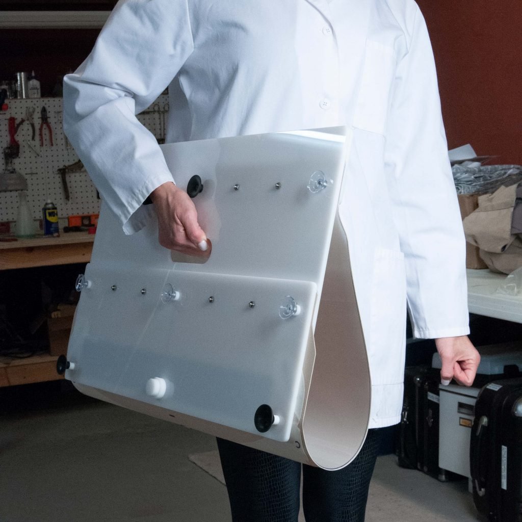 Woman holding model - Pulse MDM